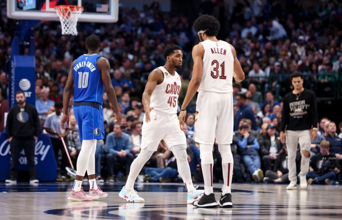 Dec 14, 2022; Dallas, Texas, USA; Cleveland Cavaliers guard Donovan Mitchell (45) celebrates with Cleveland Cavaliers center Jarrett Allen (31) during the second quarter against the Dallas Mavericks at American Airlines Center.